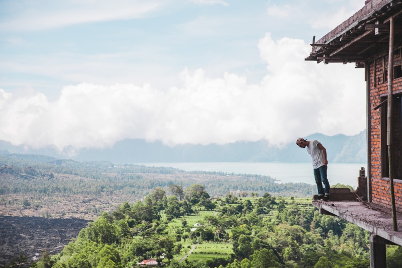 casual, balcony, tourist, casual clothing, roof, lifestyles, day, one person, climbing, built structure, nature, forest, high, building, standing, person
