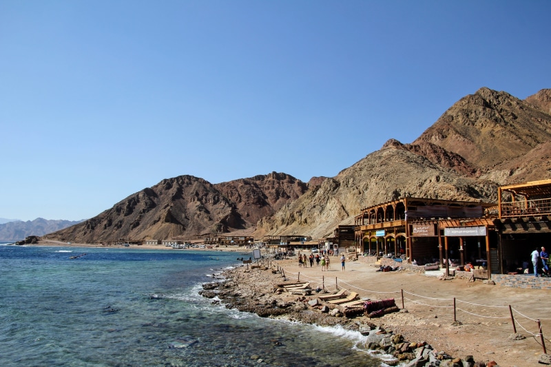 red sea, egypt, day, water, clear sky, diving, outdoors, sky, mountain range, water sports, land, blue, beauty in nature, nature, solid, beach, built structure