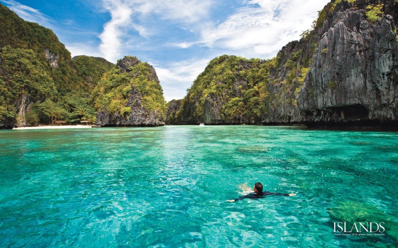 trip, land, lifestyles, scenics - nature, exotic, island, one person, rock, holiday, sky, vacations, waterfront, real people, snorkeling, beauty in nature