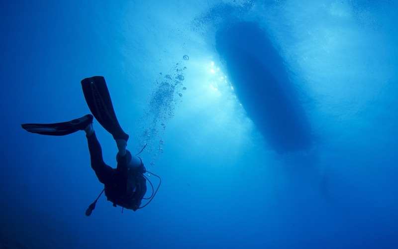 leisure activity, exploration, sea, underwater, underwater diving, diving suit, sport, low angle view, boat, undersea, Nature, aquatic sport, adventure