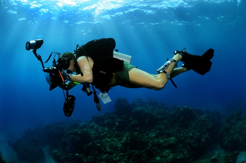 filming, swimming, person, diving equipment, camera, one person, aquatic sport, sea, underwater, underwater photographer, deep, exploration, marine, undersea