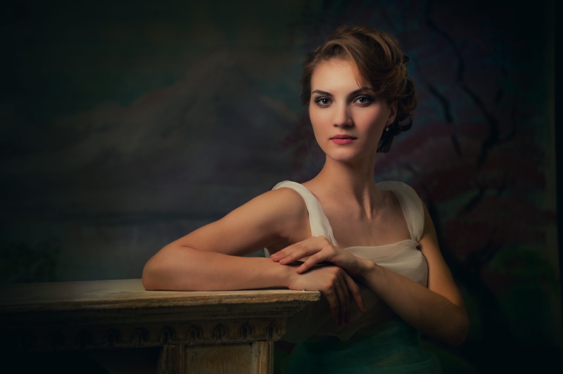 charm, studio, people, young adult, brown, white, one, clothing, table, posture, model, sentimentalism, leaning, front view, 4K, wooden, glamour, beautiful woman
