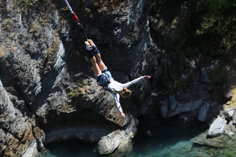 extreme sports, denim, activity, shirt, climbing, daytime, one person, sunlight, solid, woman, shorts, female, climbing equipment, outdoors, rope, short