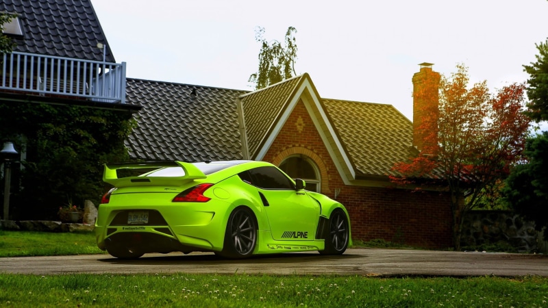 coupe, car, park, luxury, green color, building, infront, house, nature, architecture, sky, vintage car, Nissan 370Z, built structure, green cars, stationary