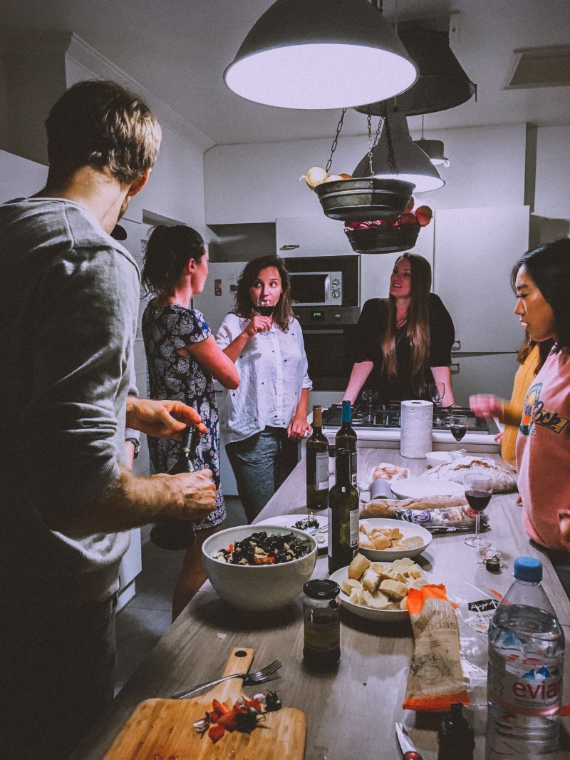 kitchen, adult, indoors, kitchenware, wine bottles, group, occupation, freshness, business, real people, males, table, leisure activity, lifestyles, dining