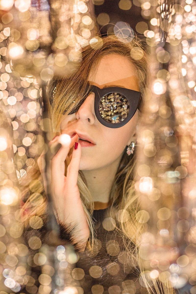 christmas, women, long hair, headshot, hairstyle, framed, hair, wearing, lips, front view, portrait, face, focus on foreground, black, sunglasses, young women