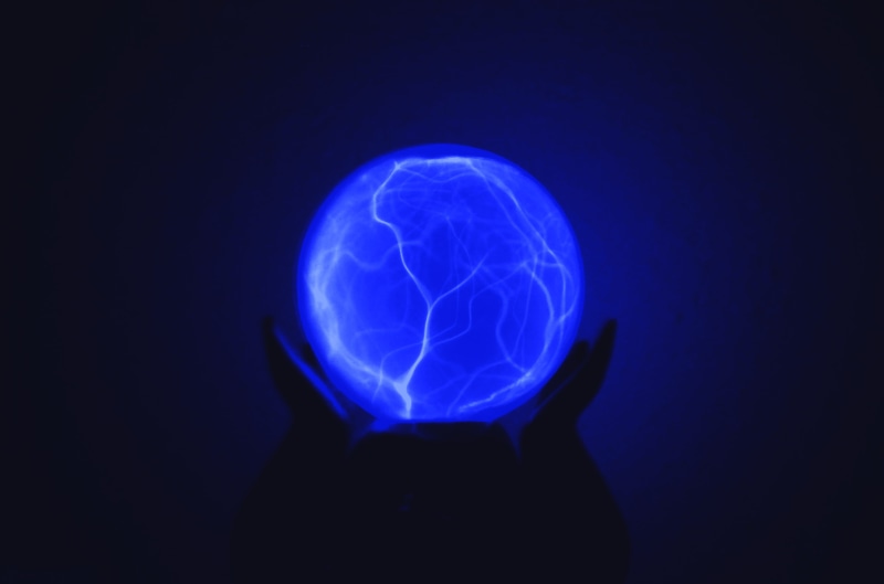 sphere, glow, body part, ball, dark blue, photo, lighted, human face, night, lamp, communication, buddha, lighting equipment, geometric shape, one person