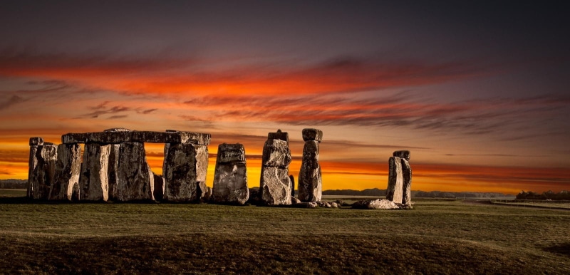 sunset, yellow, scenics - nature, outdoors, nature, clouds, England, no people, dramatic sky, solid, landscape, sculpture, orange color, cloud - sky, rock