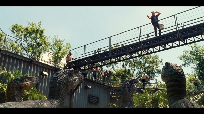 sky, movie, real people, building exterior, bridge, standing, built structure, Jurassic World, low angle view, architecture, connection, jurassic, tree