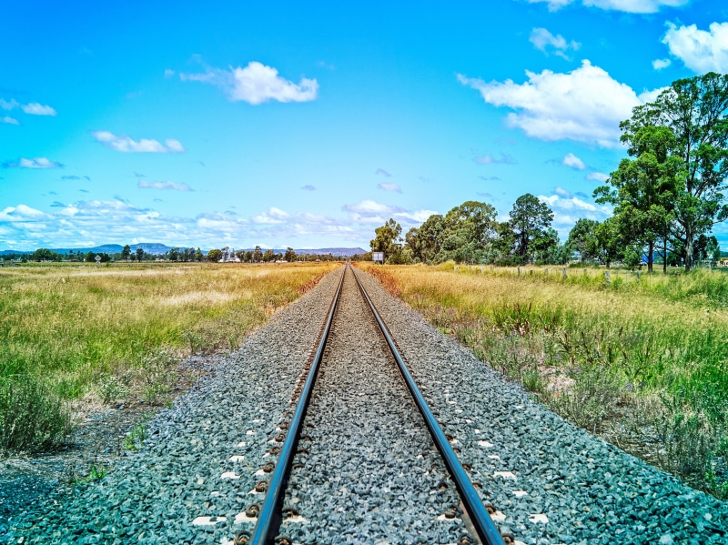 sky, perspective, steel, path, direction, line, transportation, industry, railroad track, tree, train tracks, no people, long, parallel, rail transportation