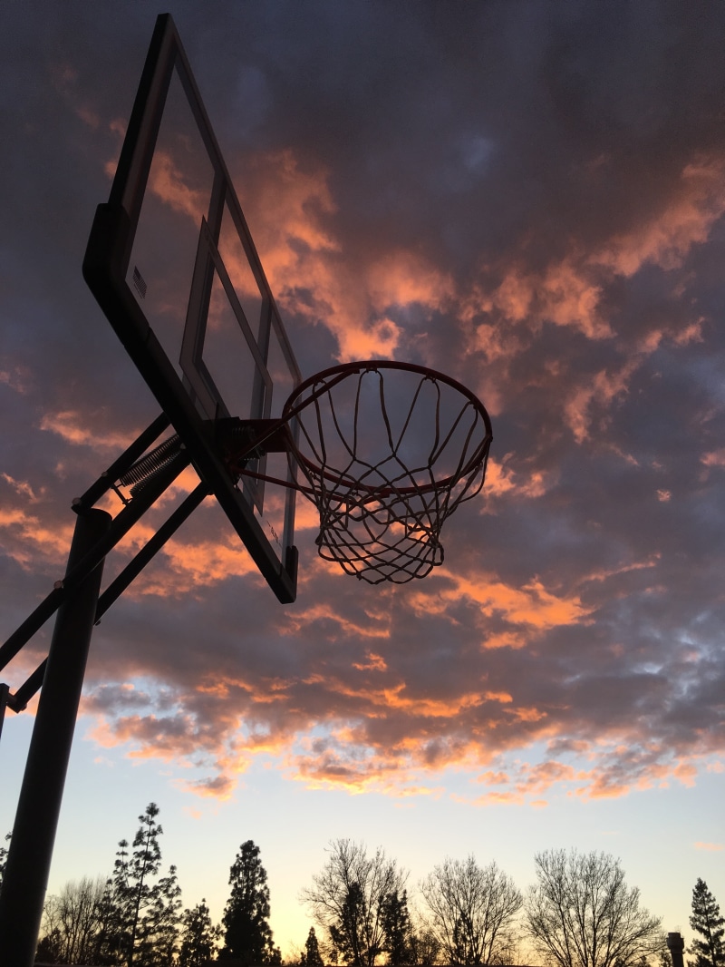 metal, basketball Hoop, hoop, dramatic sky, low angle view, basketball - Sport, sunset, no people, gray, outdoors, net - sports equipment, sky, orange color