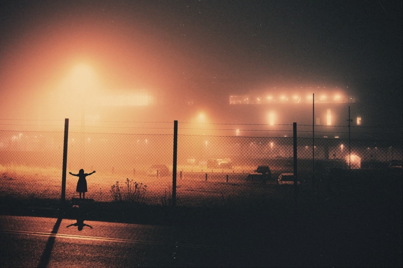 fence, night, boundary, illuminated, soccer field, no people, sport, protection, road, security, street, nature, building, safety, net - sports equipment