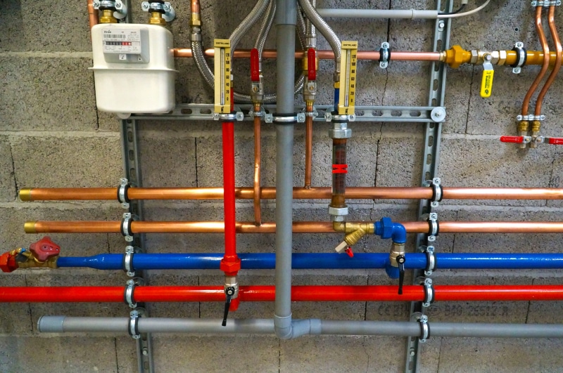 plumber, outdoors, safety, equipment, closeup, color, photo, day, fuel and power generation, railing, assorted, pipeline, connection, metal, close-up, no people