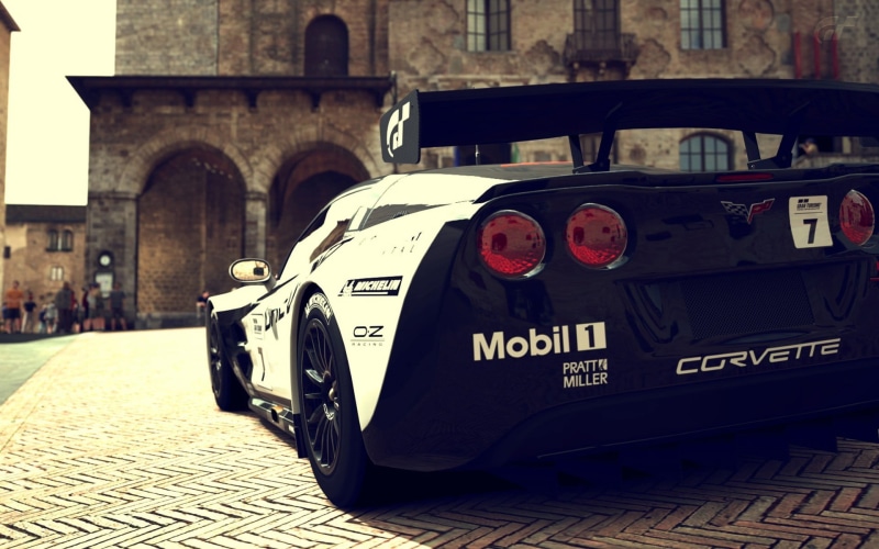 cobblestone, footpath, transportation, mode of transportation, city, stationary, no people, Corvette, building exterior, motor vehicle, day, chevrolet