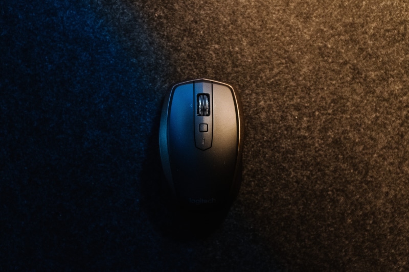 keyboard, close-up, black color, mousepad, copy space, high angle view, technology, colored background, gearshift, logitech, shadow, modem, computer, computer hardware