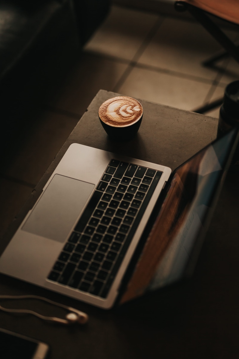 no people, pc, computer hardware, high angle view, selective focus, hardware, cup, drink, computer, gold, table, 5K, desk, beverage, indoors, beside, coffee cup