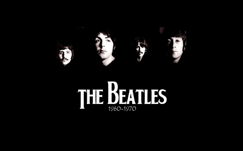 real people, 1080P, The Beatles, illuminated, looking at camera, one person, black background, Band (Music), dark, domestic room, indoors, communication