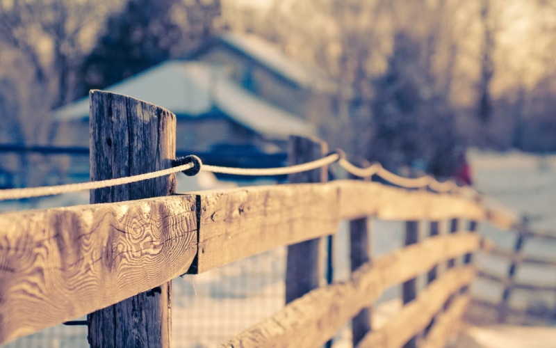 fence, railing, outdoors, vintage, focus on foreground, protection, barrier, wooden, wood - material, human hand, architecture, boundary, depth of field