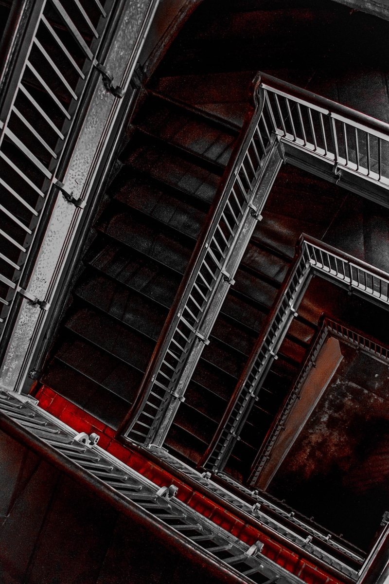 red, illusion, stair, nyc, stairs, ellis island, darkness, going down, built structure, metal, prime-shot, brown, going up, stairwell, pattern, dark, spiral
