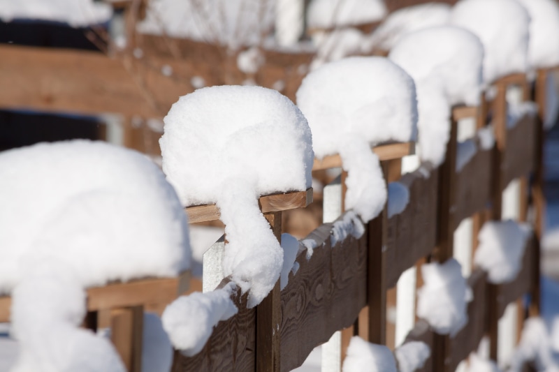 barrier, ice, warm clothing, art and craft, frozen, snow cover, snowy, craft, cold temperature, wooden slat, snowing, fence, winter, no people, outdoors