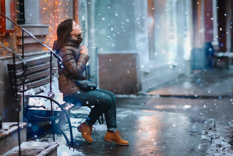 city, cold temperature, caucasian Ethnicity, winter, bench, s, building exterior, day, happiness, clothing, cheerful, blond Hair, sitting, bubble, leisure Activity