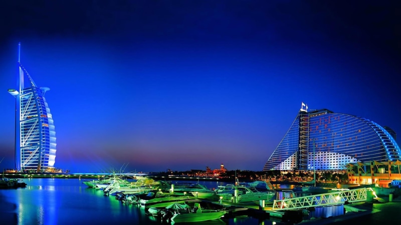 no people, office building exterior, dubai, illuminated, luxury, outdoors, asia, night sky, built structure, travel destinations, financial district, boats