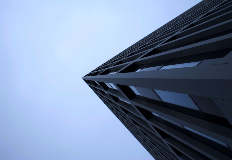 day, offices, concrete structure, blue, blue sky, architecture, directly below, office building exterior, sky, no people, window, nature, urban, contemporary