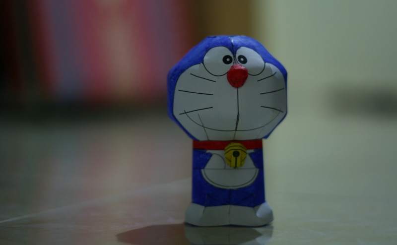 anthropomorphic smiley face, human representation, creativity, Cartoons, anthropomorphic face, close-up, representation, craft, still life, toy, indoors