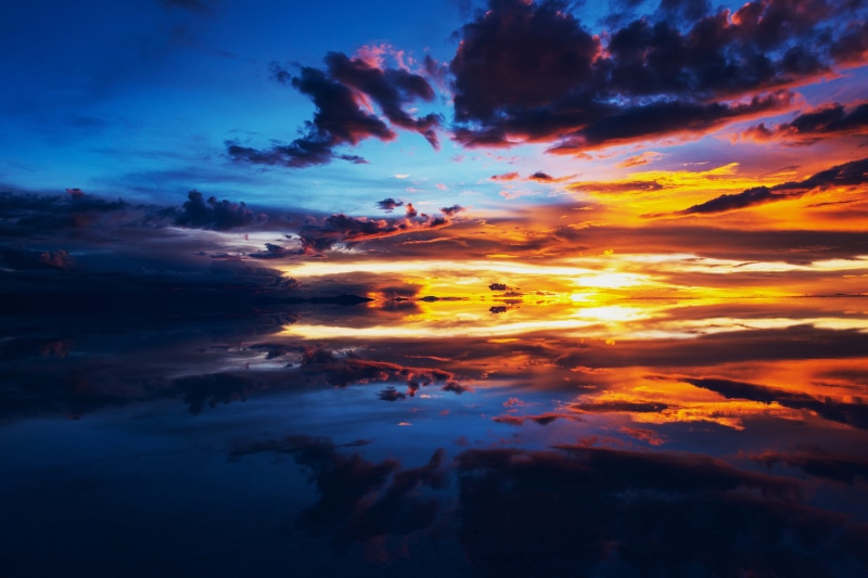 milk the salt desert, dramatic sky, outdoors, sunset, multi colored, sky, dusk, milk is infection protection, bolivia, tranquil scene, 5K, blue, orange color