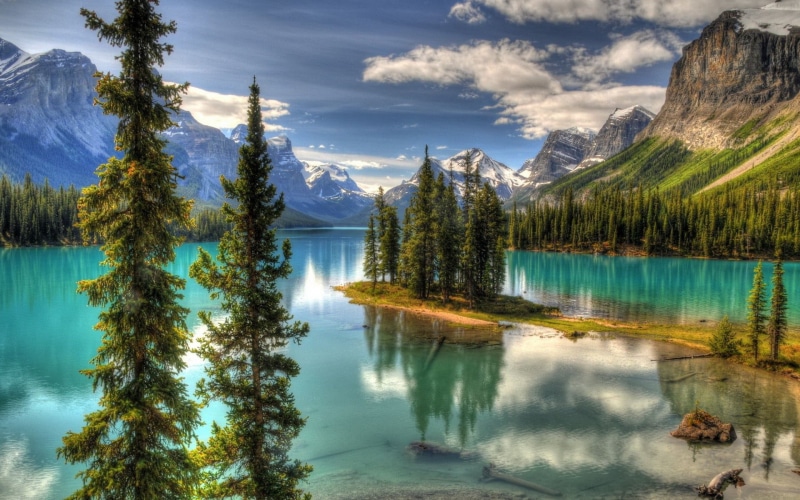 water, green color, outdoors, non-urban scene, tree, day, mountain, nature, trees, scenics - nature, snowcapped mountain, mountain range, tranquility, cloud - sky