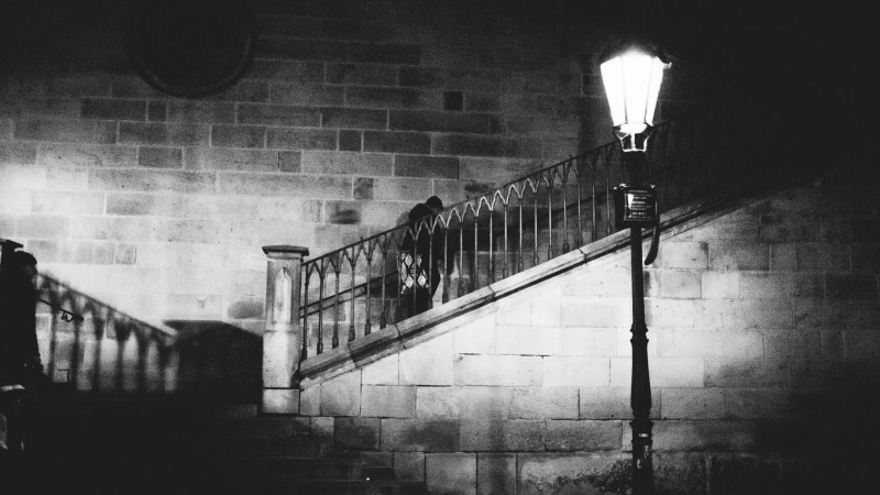 electric lamp, photography, no people, wall, city, brick, illuminated, built structure, monochrome, street light, wall - building feature, street, men