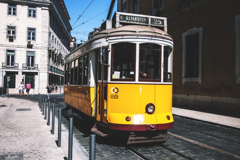 tram, city Life, land vehicle, Lisbon, railroad Track, mode of transportation, europe, incidental people, outdoors, built structure, street, cable Car