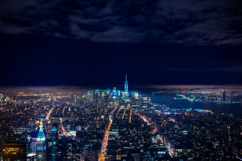 cityscape, nature, office building exterior, crowd, street, built structure, sky, dark, landscape, city, water, night, building, photo, infrastructure