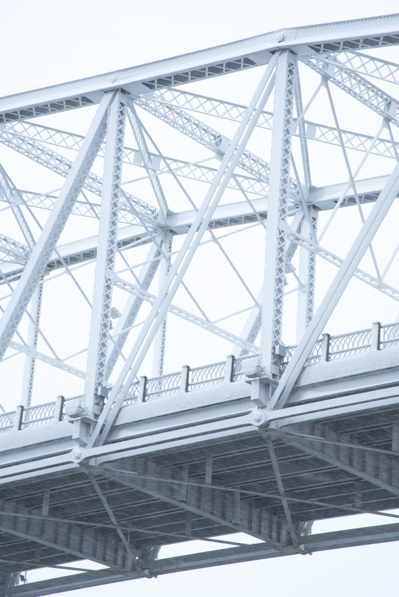 cold temperature, structure, white, infrastructure, metal, low angle view, nature, bridge - man made structure, connection, built structure, pattern, city