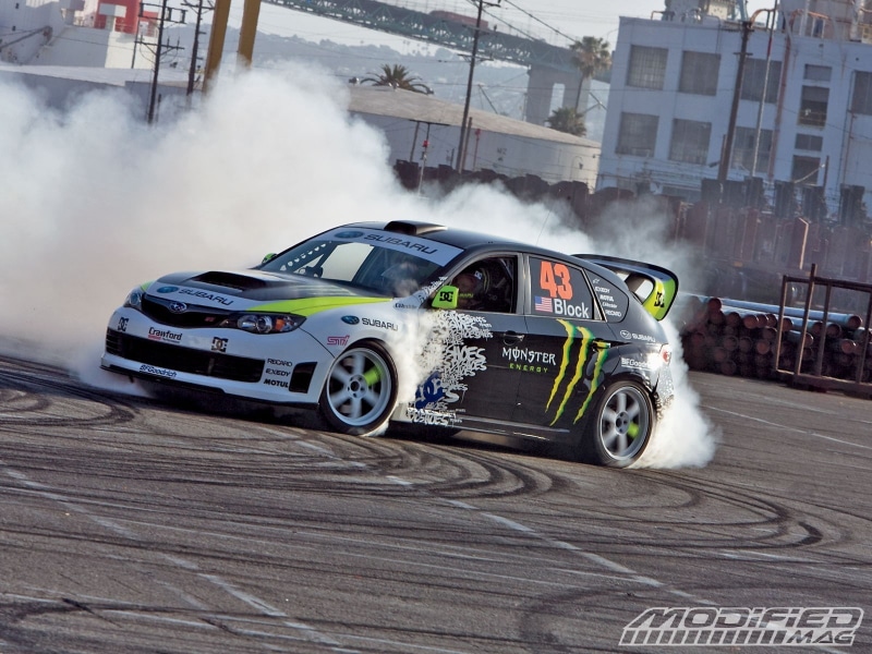 city, sport, motor vehicle, blurred motion, car show, motor racing track, road, mode of transportation, 720P, Monster Energy, Subaru, Ford, smoke - physical structure