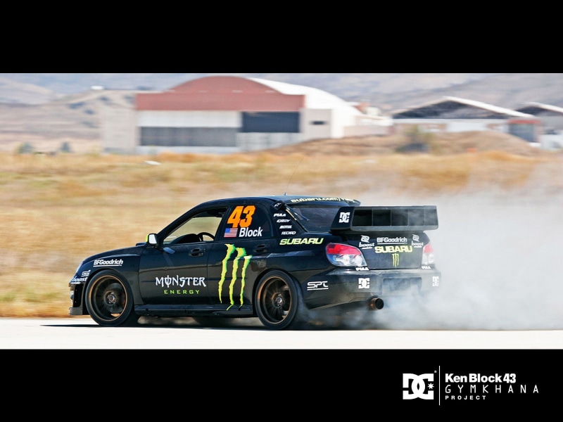 motor racing track, Ken Block, outdoors, car, driving, day, transportation, racecar, Subaru WRX STI, number, sport, motion, Subaru Impreza WRX STi, architecture