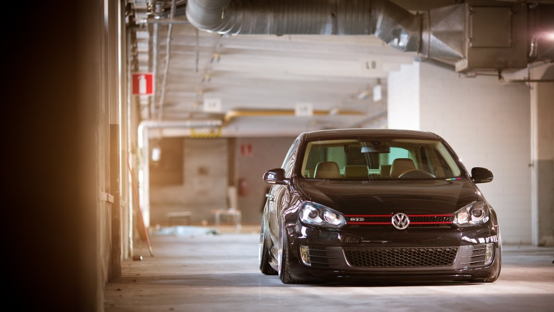 architecture, mode of transportation, focus on foreground, tuning, parking lot, door, car, hatchback, motion, motor vehicle, day, on the move, Jetta, transportation