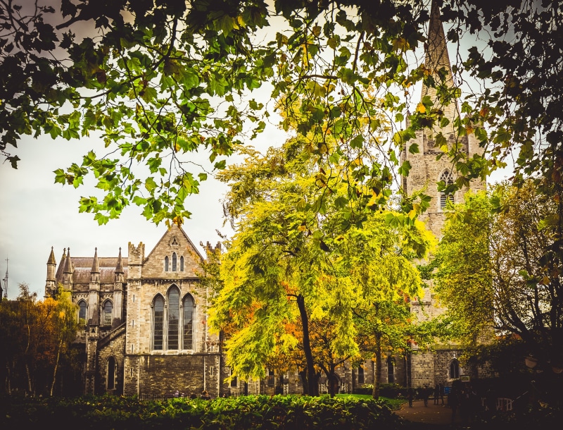 sky, history, place of worship, tree, belief, fall, plant, architecture, ireland, outdoors, built structure, growth, nature, the past, religion, no people