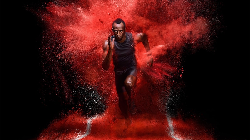 sport, studio shot, running, clothing, smoke - physical structure, Usain, sportsman, motion, vitality, young adult, black background, front view, splashing