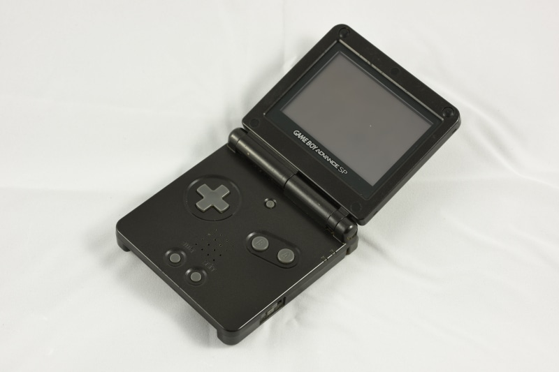 white background, gaming, portability, white color, high angle view, handheld, arts culture and entertainment, 5K, white, no people, portable, black color