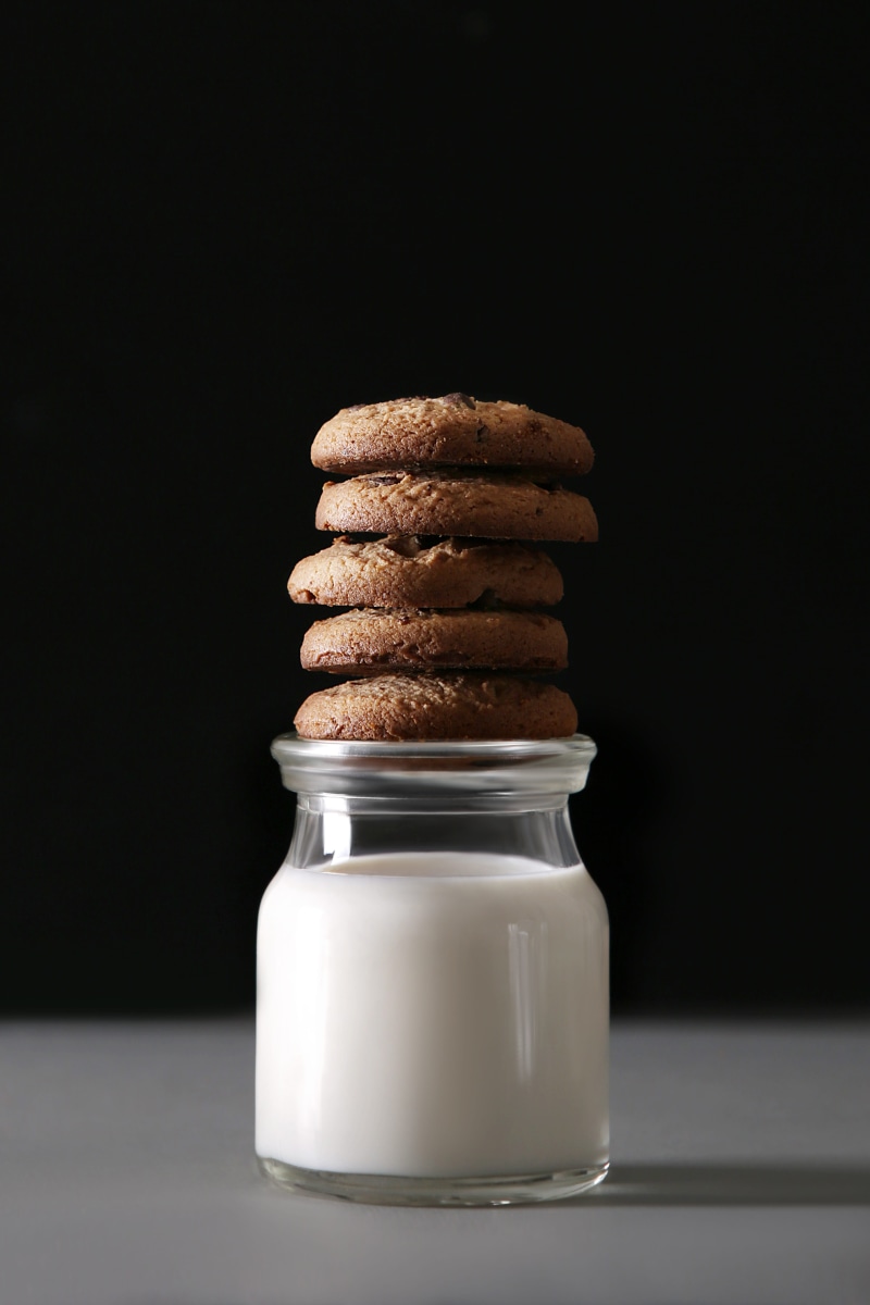still life, baked, ball, black background, freshness, balance, sweet food, copy space, no people, food and drink, lam banh, food, milk, jar, table, stack