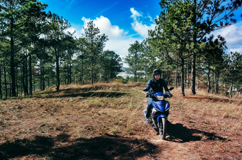 full length, sky, travel, clouds, dalat, leisure activity, 2K, tree, blue, beauty in nature, plant, backpack, biker, vietnam, speed, sport, non-urban scene