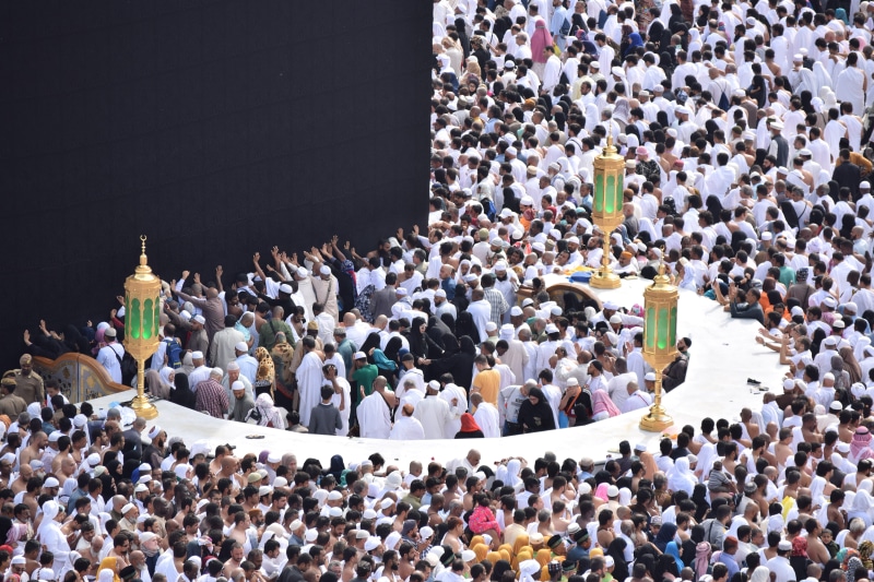 women, leisure activity, place of worship, sitting, belief, real people, high angle view, architecture, people, lifestyles, group of people, togetherness