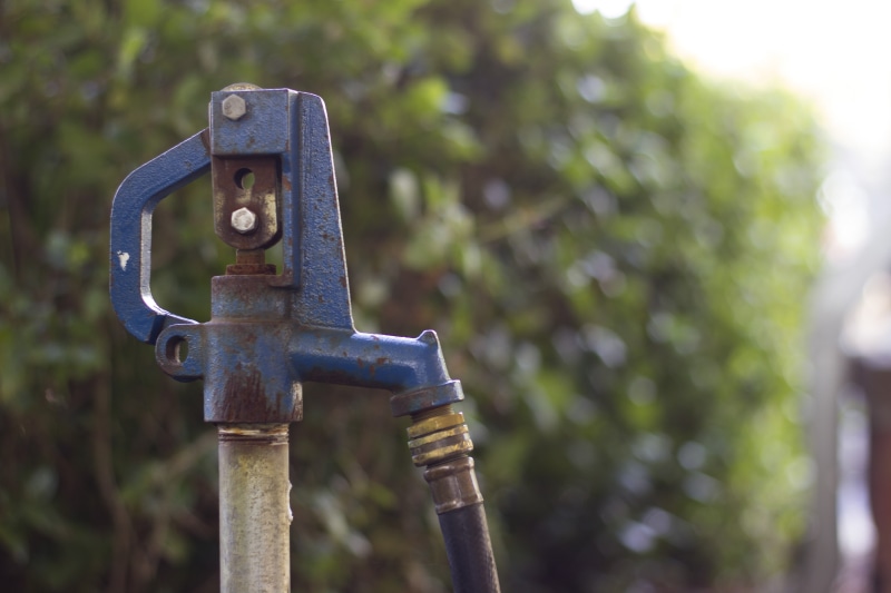 outside, nut - fastener, rusty, plumbing, nature, equipment, selective focus, machinery, outdoors, hose, connector, close-up, water, old, no people, day