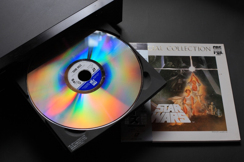 geometric shape, retro, no people, multi colored, music player, western script, album, studio shot, video, 5K, sound, compact disc, aggression, dvd, data