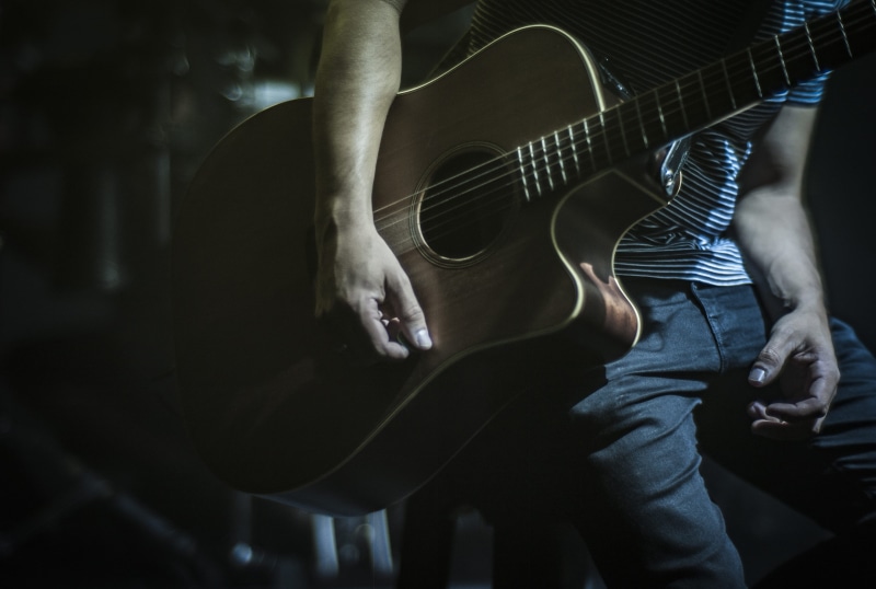 plucking an instrument, musical equipment, real people, musical instrument string, skill, midsection, indoors, men, string instrument, string, 4K, musical instrument