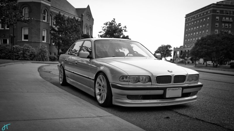 grayscale, urban, bmw E38, photo, street, built structure, monochrome, retro styled, motor vehicle, road, nature, building, outdoors, plant, tree, architecture