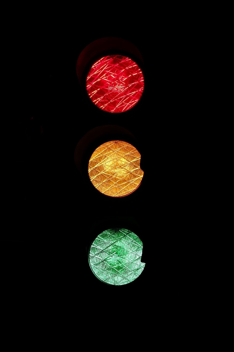 night, caution, sign, attention, wait, rules, outdoors, red, red light, no people, traffic light signal, green, paradox, close-up, 2K, nonsense, absurdity