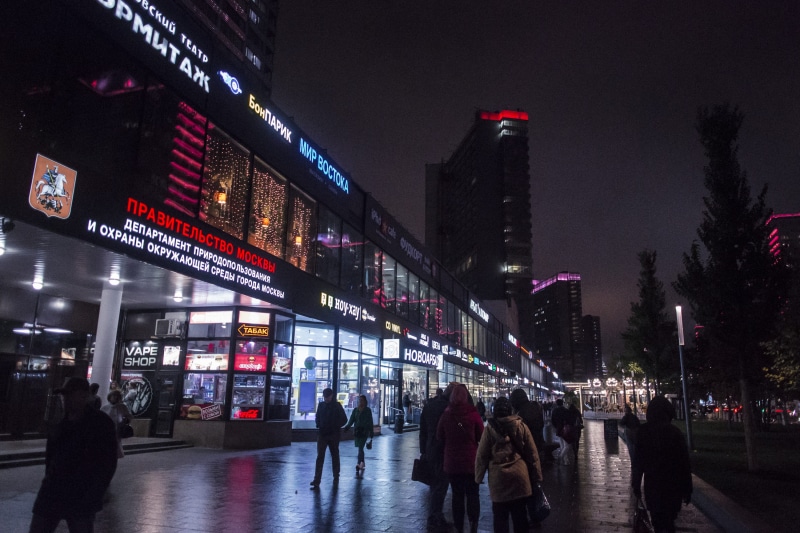 life, new arbat avenue, men, illuminated, neon, aesthetic, cityscape, real people, office building exterior, composition, dark, built structure, night