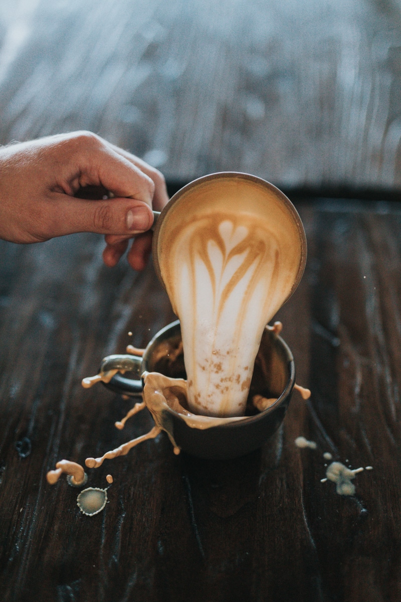 black, hand, finger, cup, mocha, coffee, refreshment, food and drink, indoors, real people, mug, coffee brean, pour, coffee cup, macchiato, coffee bean